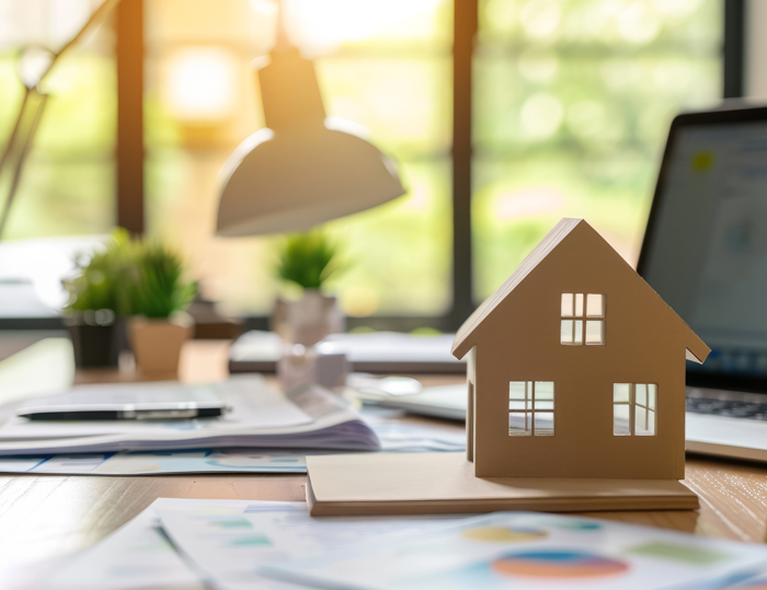 A model home on a desk