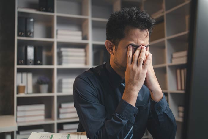 A person with a headache